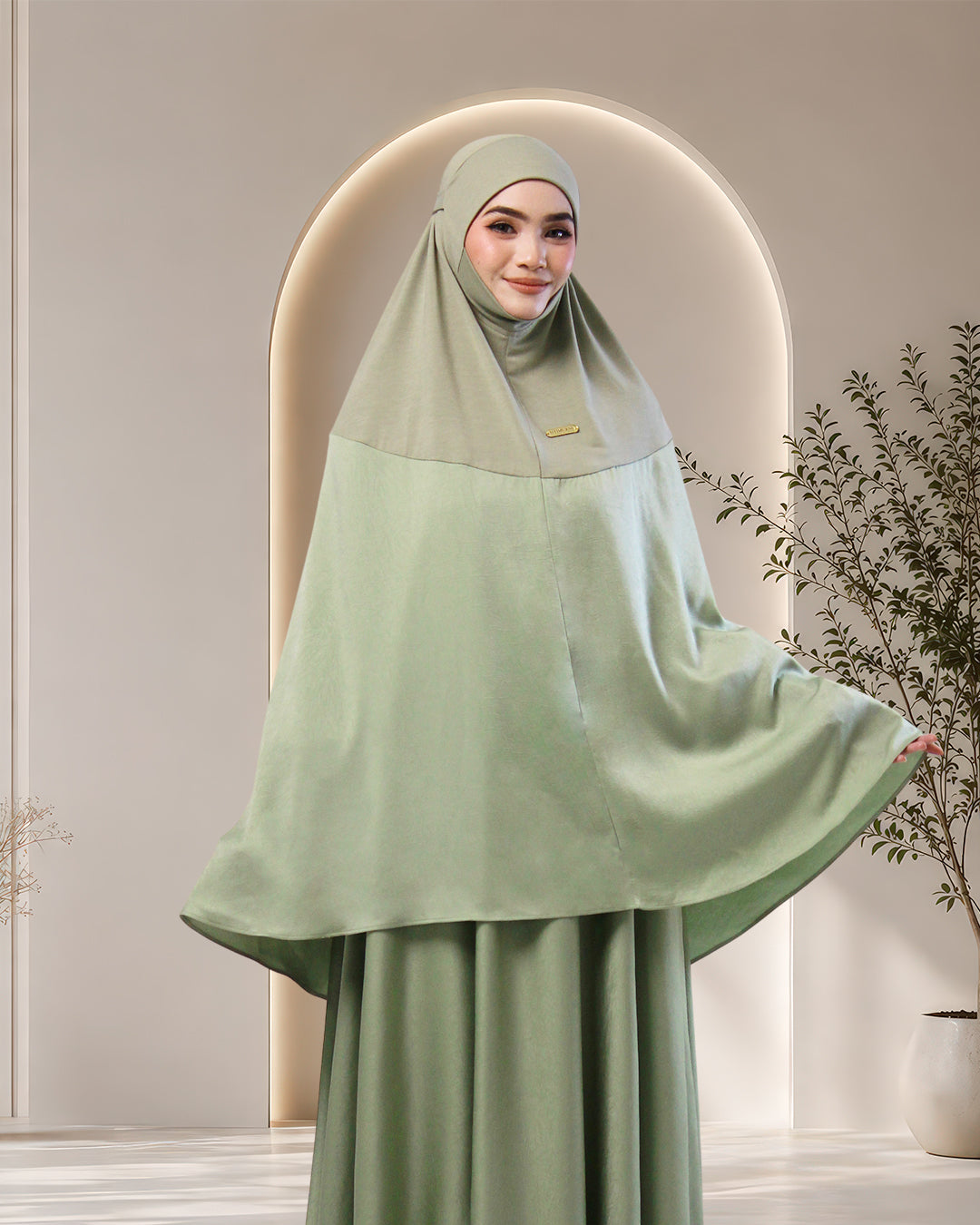 NUR UMRA IN JADE GREEN