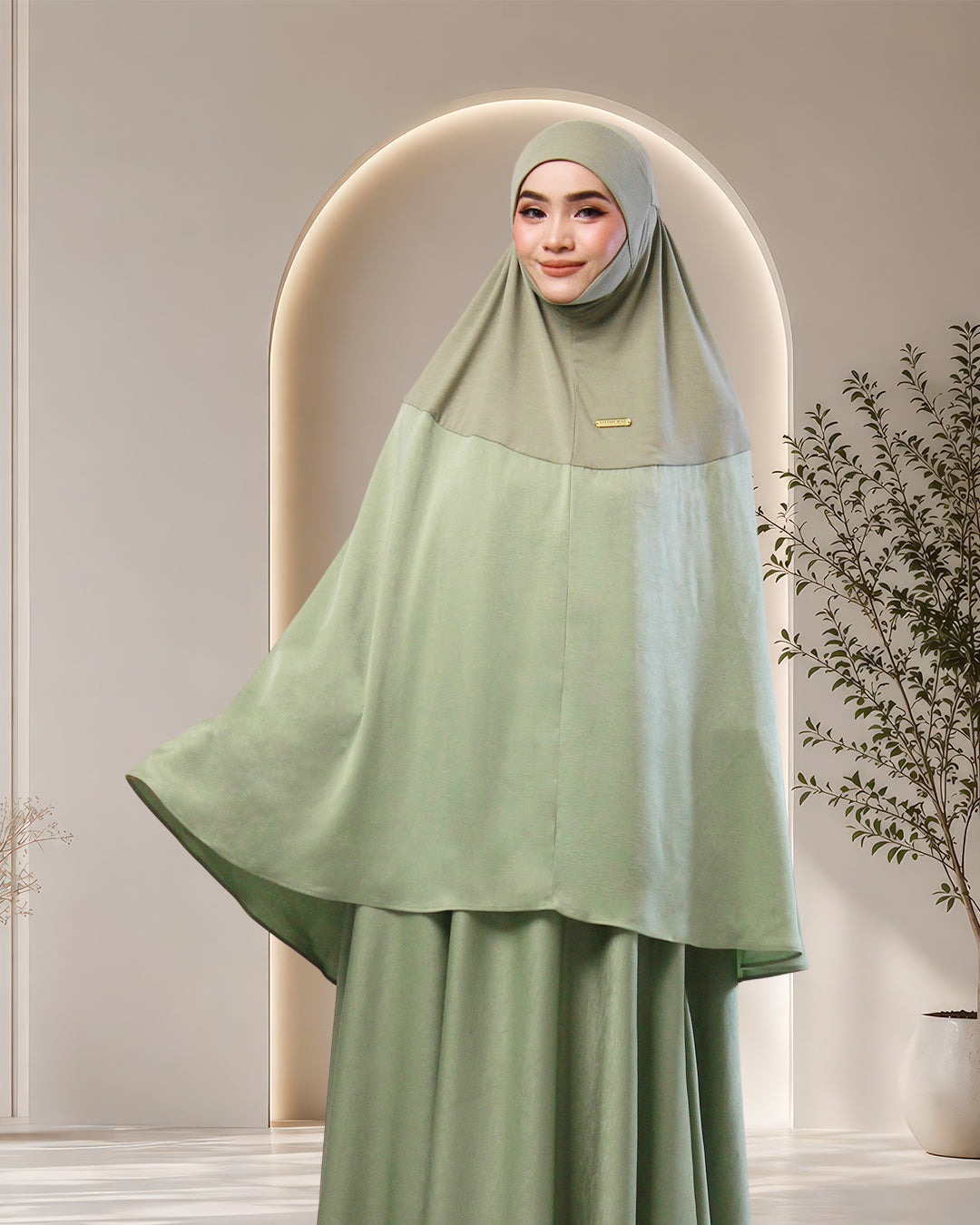 NUR UMRA IN JADE GREEN