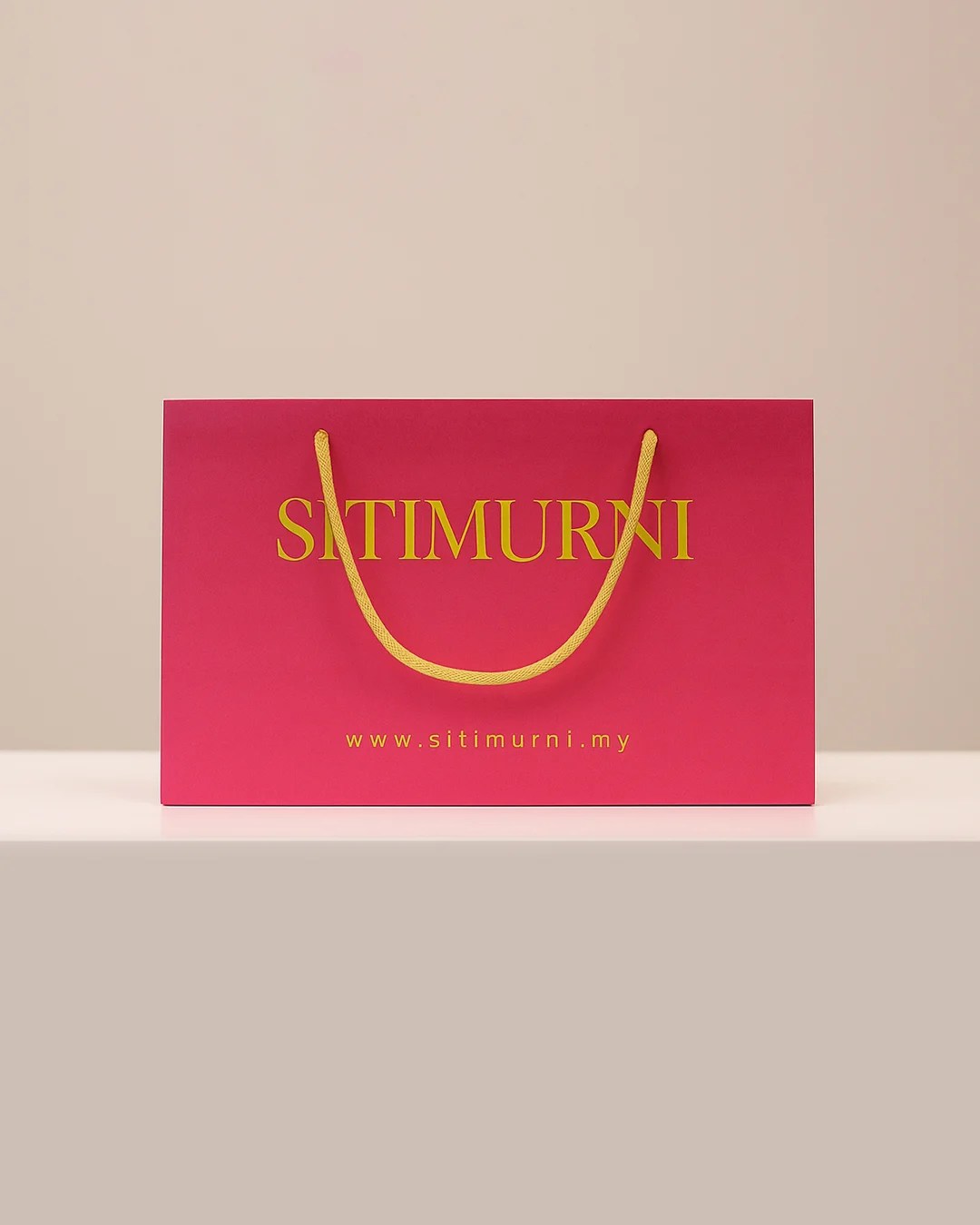 PAPER BAG IN PURPLISH PINK (COMPACT)